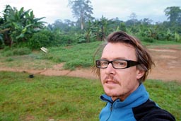 Fantastic cold morning, Manfred in blue jumper, village of ITI, Liberia.