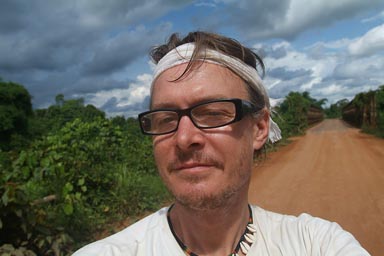 Dirt Road, smiling Manfred in Africa, near Buchanan, Liberia.