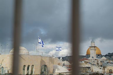 Israeli flags fly high, Rock of the dome.