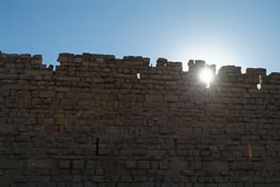 Sun behind Wall of Karak Castle, Jordan.