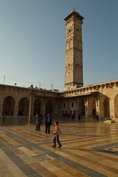 Great Mosque of Aleppo. Minaret and boy.