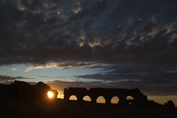 City walls, arches, sunset light through. Resafa, Syria.