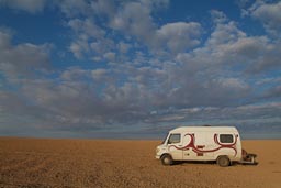 Camp in Syrian desert, is a dry, lea field.