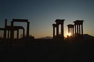 Sun through tetrapylon silhouette, Palmyra.