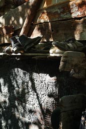 Shoes on shelf, wooden barn, farm, Camlikaya, Turkey.