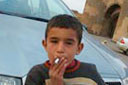 Ani boy smoking, Turkey.