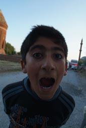Child in Ahlat, teenager, shouts.