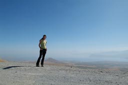 Christina on Nemrut crater rim eastern Turkey, Lake van below in a haze.