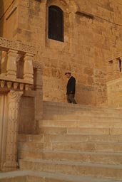 Going for the Mass, Mor Hanayo, old man, Deyr ul-Zafaran. Turkey.