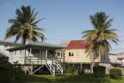 Wooden houses on poles, near water front old Belize City.