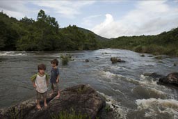 Daniel and David, Macal River, jungle all around. .