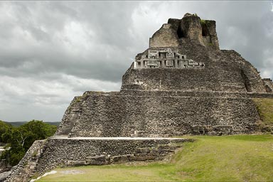 Sculptured frieze on structure in Xunantunich showing monumental masks, Belize.