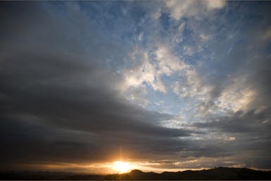 Sunset under heavy clouds. San Luis, Guatemala.