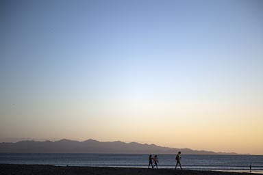 Costa Rica in a hazy evening distance over the bay, seen from El Ostional, Nicaragua.