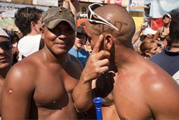 Slut imprinted on head. Tattoo on temple of man, carnival, gay comunity, Las Tablas, Panama. Slut imprinted on head. Tattoo on temple of man, carnival, gay comunity, Las Tablas, Panama.
