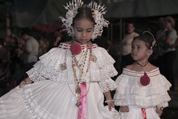 Show me how you can turn big sister. Youngest of the carnival girls. Las Tablas, Panama. 