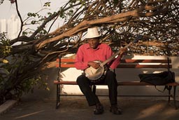 Banjo player sings Belafonte, Panama.