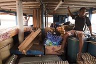 The load on the commercial cutter, leaving from Miramar to Porvenir, Guna Yala, rough sea, Panama.