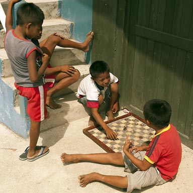 Checkers played by Guna children on San Blas island, Panama.