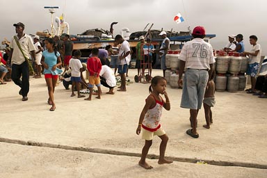 Crowded pier, San Ignacio, Unloading of commercial ship, In Guna Yala islands all comes by boat. Panama.