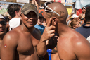 Slut imprinted on head. Tattoo on temple of man, carnival, gay comunity, Las Tablas, Panama.