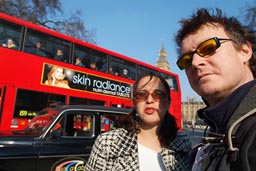 Hasna, me in London, Big Ben, Taxi, and red double decker bus.