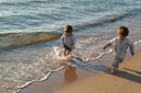 Wetting feet in ocean.