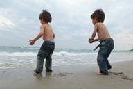 Jeans, sand and water.