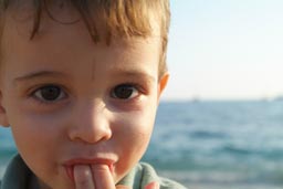 Daniel, finger in mouth, 2 year old boy and 2 fingers in his mouth.