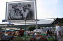 Cherbourgh, market mit D-day poster, July2004.