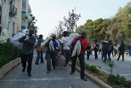 Clandestine Africans in Athens, fake Gucci merchandise.