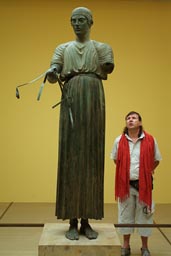 Delphic charioteer, admiring tourist.