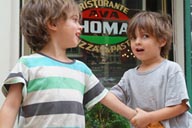 Sharing a pizza.