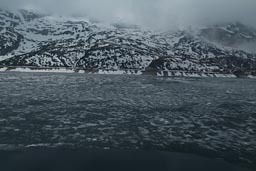 Icey lake, Passo Fedaja, Dolomites.