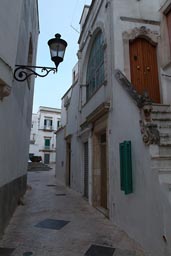 Locorotondo, centro storico, narrow street and steps.