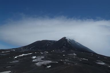 Mount Etna summit in clouds.