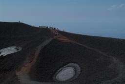Mount Etna top cratar people/tourists..