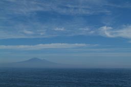 Etna, morning hazy view over the sea.