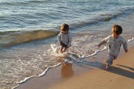 Wetting feet in ocean.