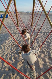 Boys on swing.