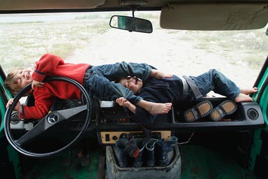 Lying on dashboard.