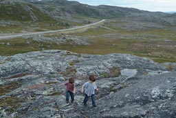 Our road, in back, exploring the terrain.