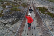 Crossing a hanging bridge.