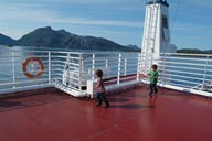 Boys on late ferry ship, Fjord, Norway.