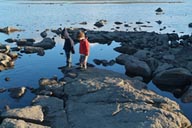 Late walk on shore of high altitude lake, Norway.