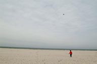 Daniel on beach and plane.