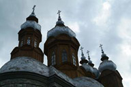 Orthodox country church, Dreptu Romania Bistrita, wooden with guilded domes.