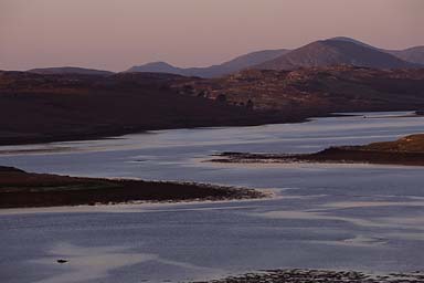 Scotland, Outer Hebrides, landscape and lochs in sunset light.