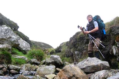 climbing over the trench of a waterfall