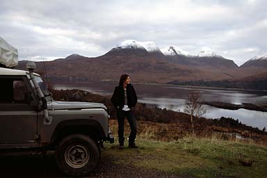 Snow on mounts in back and loch and LR in front